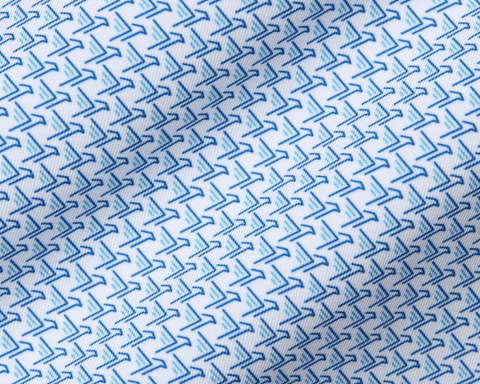 The Justice Shirt: Harbor & Maidstone Blue, features a white fabric with small, angular blue boomerang motifs, offering four-way stretch and breathability.