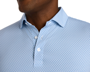 Close-up of The Justice Shirt: Harbor & Maidstone Blue featuring a spread collar and geometric print, highlighting its performance fabric with moisture-wicking and stretch properties.