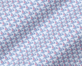 Close-up of The Justice Shirt: Napa & Pacific Blue fabric showing its blue and red stylized print on white, with a soft performance jersey feel.
