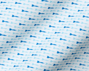 The Cadogan Shirt: Harbor & Maidstone Blue, showcasing a close-up of breathable fabric with tiny blue arrow motifs, highlighting its soft, moisture-wicking texture and structured collar.