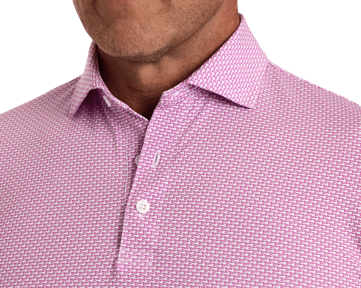 Man wearing The Hanover Shirt: Cabernet, a long-sleeve dress shirt with a geometric pattern, top button undone, showcasing the structured spread collar and performance fabric.