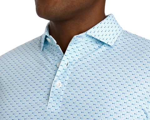 The Cadogan Shirt: Harbor & Maidstone Blue features a light-blue polo with geometric pattern, fold-over collar, and three-button placket, crafted from breathable AIRATION® fabric.