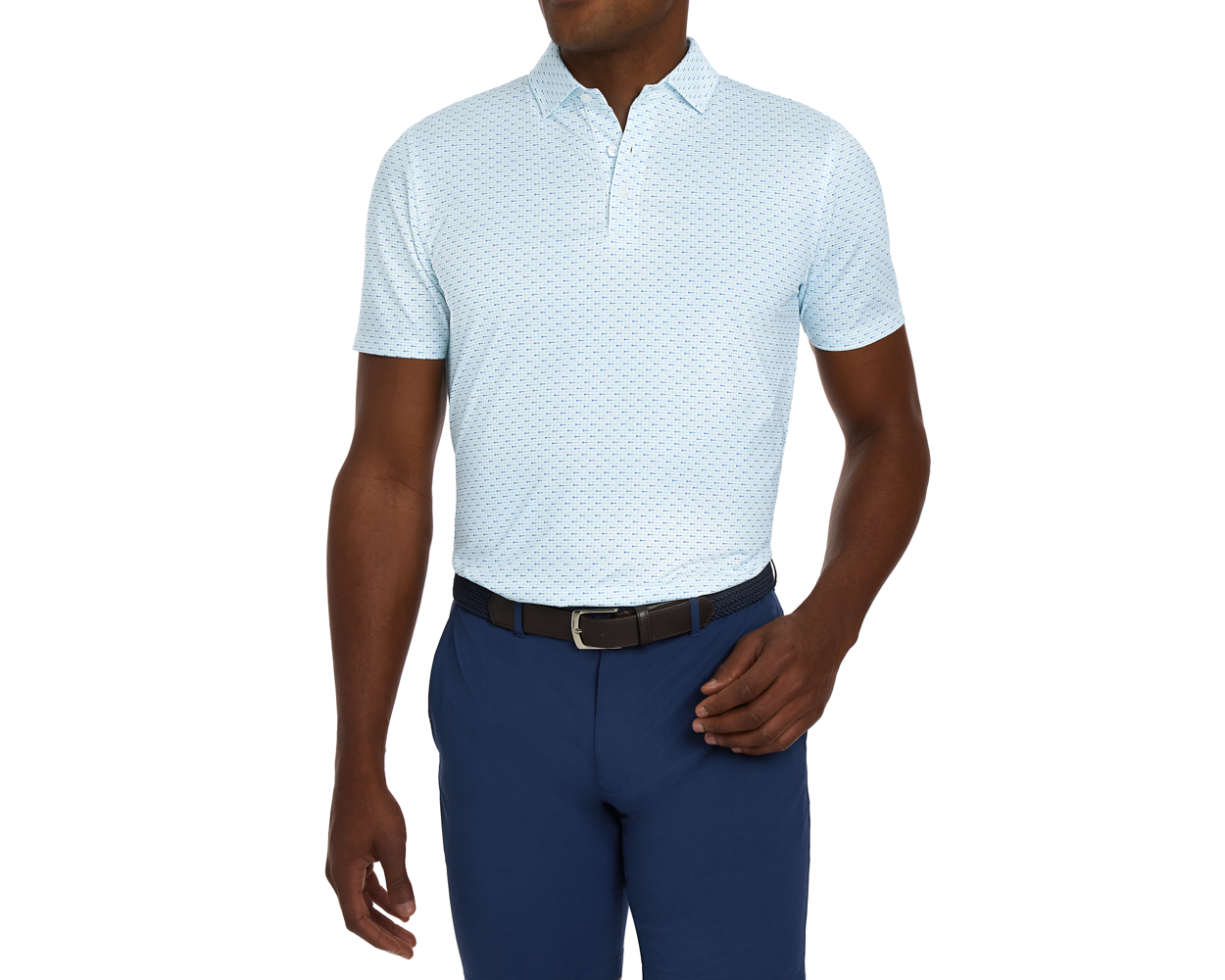 Man wearing The Cadogan Shirt: Harbor & Maidstone Blue, a light-blue polo with micro-print, navy trousers, dark woven belt, showcasing breathable fabric and structured collar.