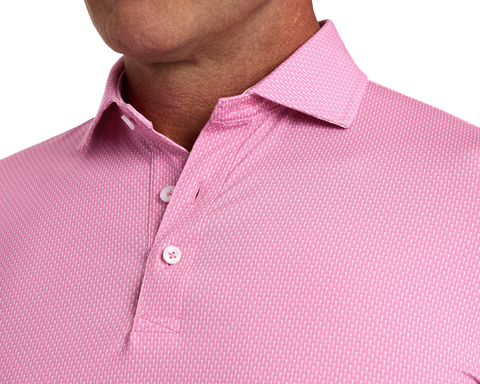 The Hicks Shirt: Belmont, featuring a geometric pattern, spread collar, and white buttons, crafted from soft, stretchy performance jersey for breathability and sun protection.