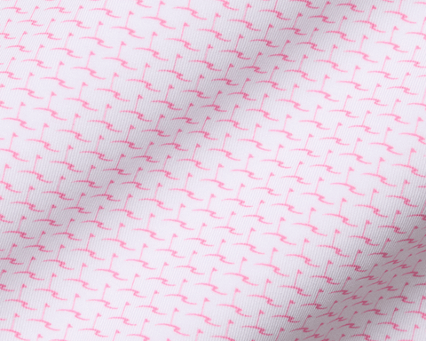 The Atwood Boys Shirt: Belmont features a white fabric with a tiny pink flamingo pattern, offering comfort and protection with performance jersey material.