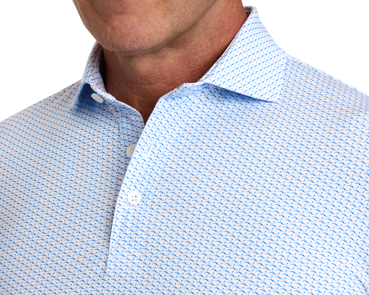 The Atwood Shirt: Horizon Blue, featuring a light blue with dark blue geometric pattern, open collar, structured spread collar, and part of a man's tanned jawline.