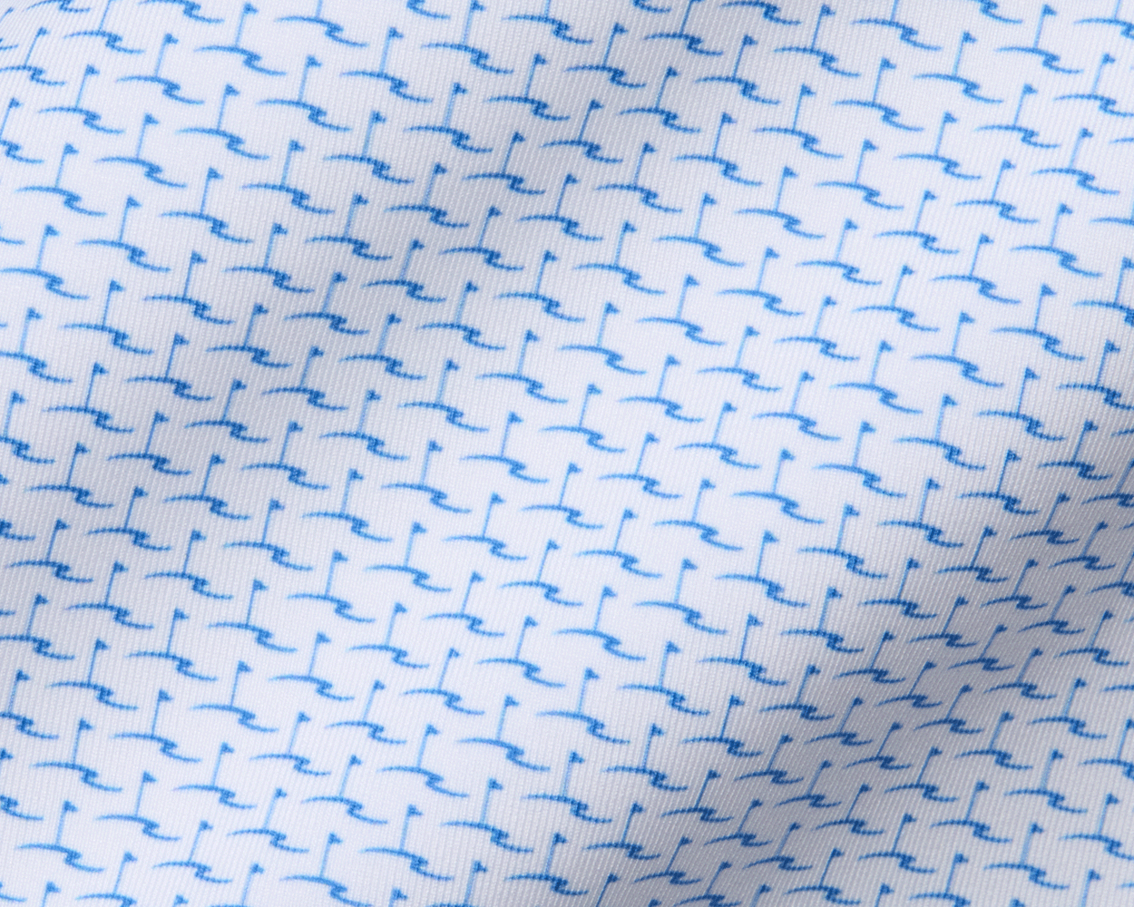 The Atwood Boys Shirt: Horizon Blue features a white woven fabric with a tiny, stylized blue bird motif, offering breathability, moisture-wicking, and UPF 50+ protection.