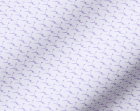 Close-up of The Atwood Shirt: Tudor, showcasing a white fabric with a purple motif pattern, featuring a structured spread collar and signature fit.