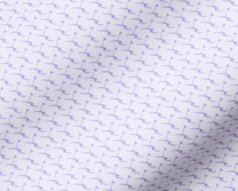 Close-up of The Atwood Shirt: Tudor, showcasing a white fabric with a purple motif pattern, featuring a structured spread collar and signature fit.