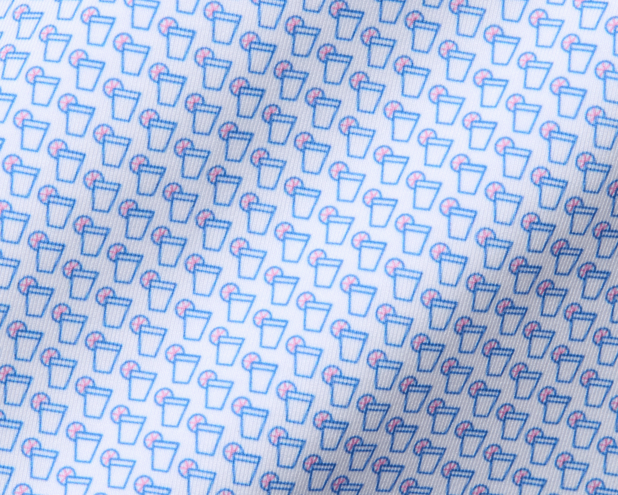 The Fulton Shirt: Belmont & Horizon Blue features a subtle cocktail pattern with line-drawn glasses, perfect for warm-weather comfort and style.
