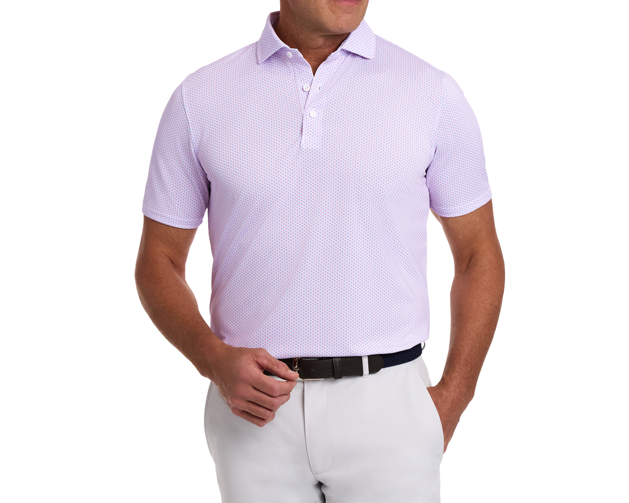 Man wearing The Lennox Shirt: Belmont & Horizon Blue, showcasing its geometric pattern and paired with light trousers, highlighting the shirt's breathable and moisture-wicking features.