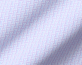 The Norwood Shirt: Vista Blue & Tudor features a woven geometric pattern with T-shaped motifs, showcasing subtle folds and a structured spread collar.