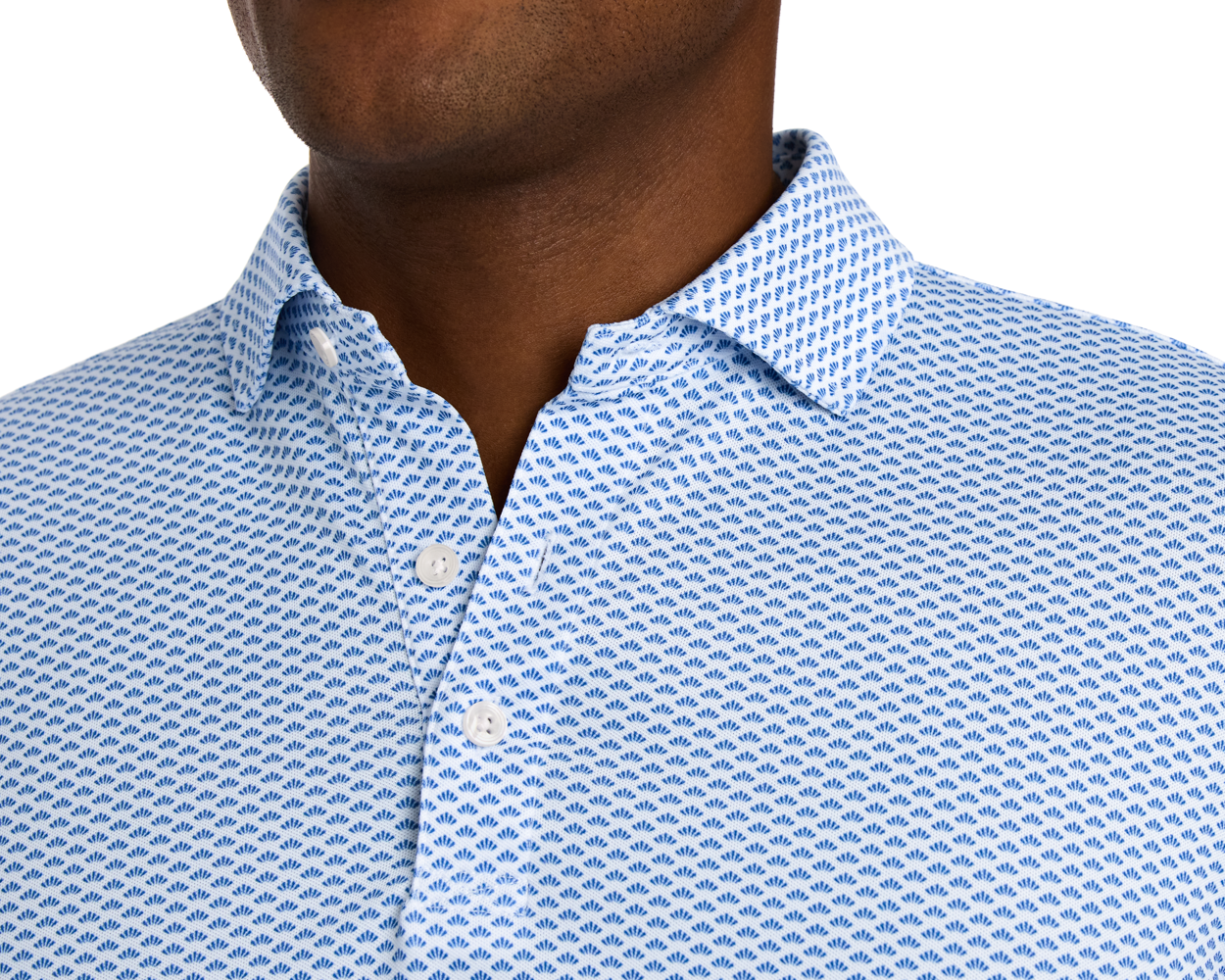 The Geiger Shirt: Maidstone Blue, featuring a blue fan pattern on white, showcases a breathable, moisture-wicking pique fabric with a structured spread collar.