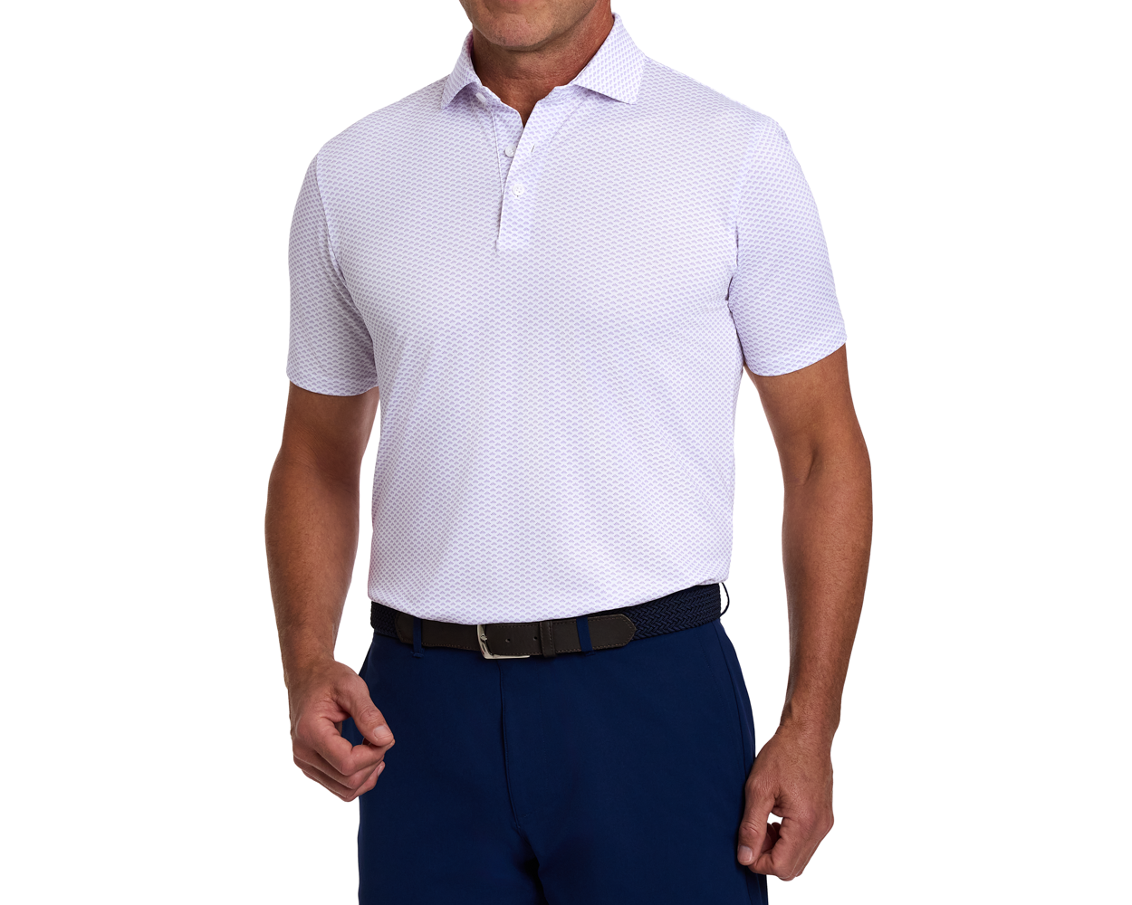 The Geiger Shirt: Tudor, a short-sleeve polo with a repeating pattern, offers moisture-wicking performance and UPF 30+ protection, paired with navy trousers and a woven belt.