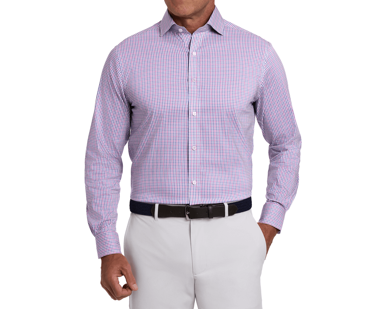 Man wearing The Wright Shirt: Belmont, a long-sleeve, button-down with small check pattern, tucked into gray trousers. Features structured spread collar and performance fabric.