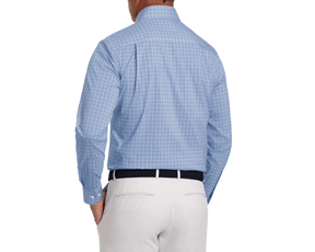 Rear view of a man wearing The Wright Shirt: Vista Blue, a light-blue check dress shirt, with light-beige trousers and a dark woven belt.