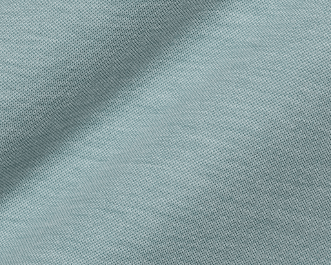 Close-up of the fine pique knit texture of The Cullinane Shirt: Heathered California Spruce, showing the soft, breathable cotton-blend knit.