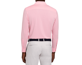The Goodrich Shirt: Belmont, a collared long-sleeve shirt, worn tucked into trousers, highlighted by a dark navy belt, perfect for versatile styling.