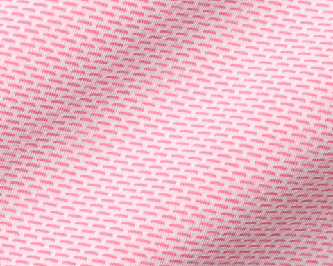 The Goodrich Shirt: Belmont features a white fabric with pink dashes, showcasing a textured pattern, crafted from breathable Swing Knit® fabric with a structured spread collar.