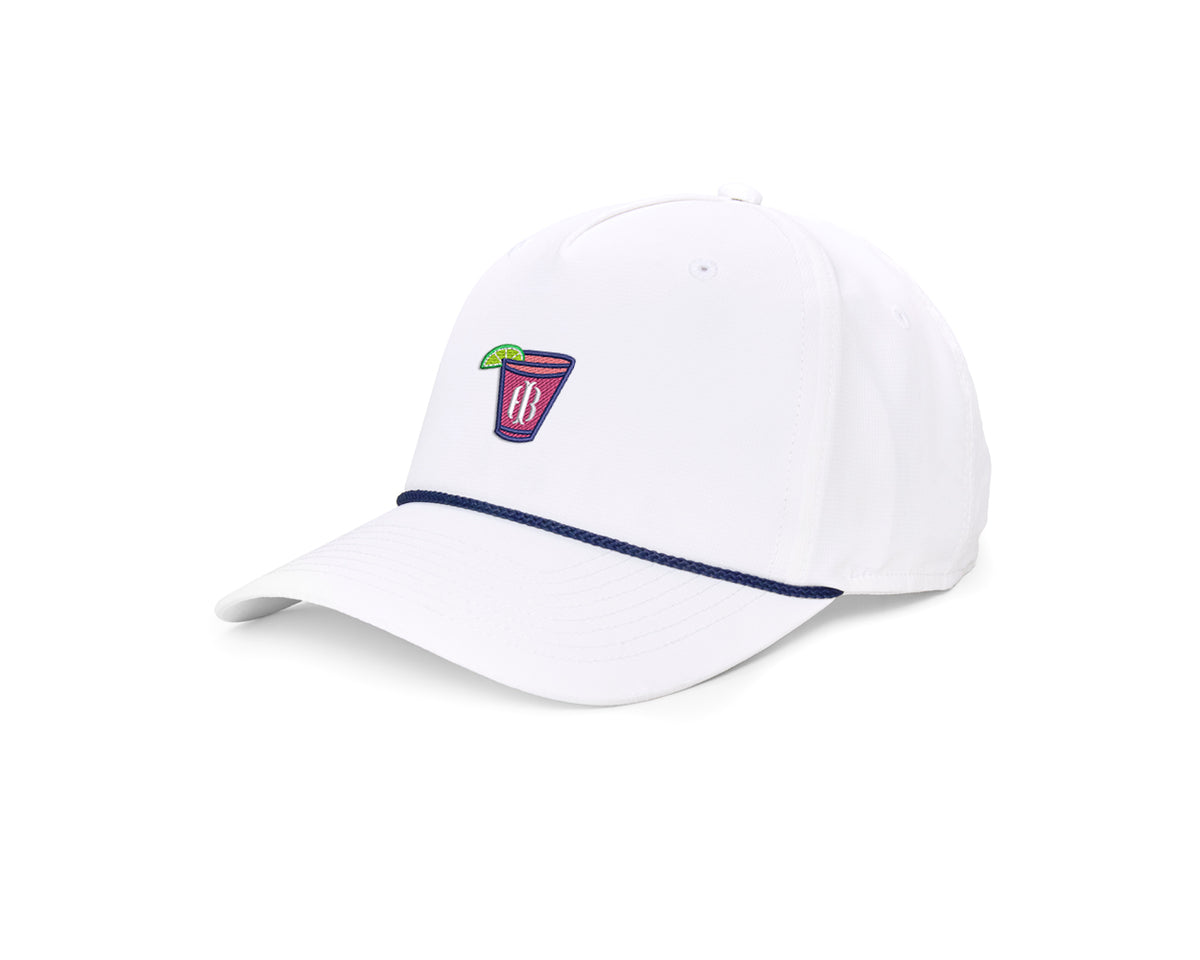 The Performance Rope Hat: White with Transfusion Icon features a curved bill, navy rope detail, cocktail glass logo, and adjustable snap-back closure.