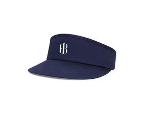 The Cocktail Tour Visor: Navy with HB Icon features an open-top design, stiff brim, moisture-wicking terry cloth sweatband, and adjustable gunmetal buckle for comfort.