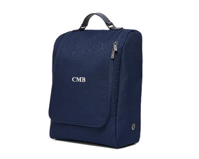 The Rutledge Shoe Bag: Navy Ballistic - White Embroidery with top handle, front flap pocket, side zippered compartment, and CMB initials embroidered on the front.