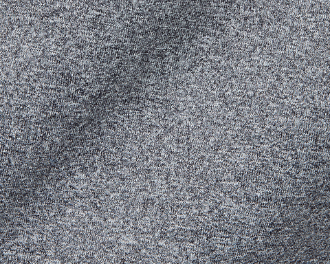 Close-up of The Westland Boys Quarter-Zip: Charcoal, highlighting its grey knitted texture with interlocking loops, showcasing the soft, versatile fabric design.