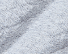 Close-up of The Wallace Boys Hoodie Sweater: Heathered Gray, showcasing the soft, loop-back knit texture of the breathable Egyptian cotton fabric.