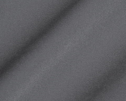 Close-up of The Saunders Short: Iron Gray, showcasing its fine diagonal rib-like texture, gentle folds, and performance fabric designed for stretch and breathability.