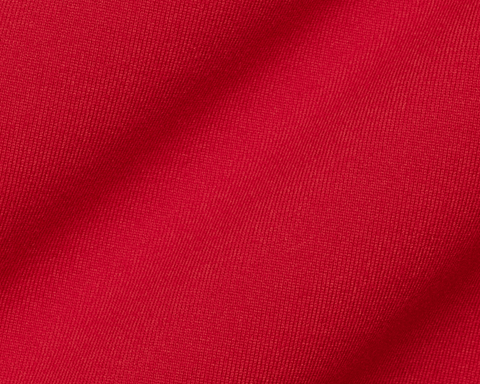 Close-up of The Jackson Hoodie: Liberty, showcasing its fine knit texture. Lightweight and minimalist design, ideal for golfing, with no obstructive drawstrings or pouches.