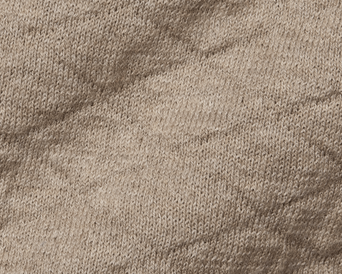 Close-up of The Wallace Hoodie Sweater: Heathered Light Dune, showcasing intricate knit stitches and texture in 100% Egyptian cotton, highlighting its quality and warmth.