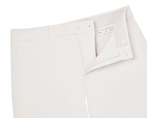 The Harwood Short: Stone, featuring a partially open button and zipper fly, waistband with belt loops, side pockets, and Holderness & Bourne label inside.