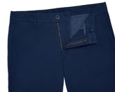 The Cameron Short in navy, showcasing the waistband with belt loops, button closure, and partially unzipped zipper fly, highlighting its premium cotton/stretch twill fabric.
