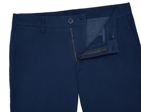 The Cameron Short in navy, showcasing the waistband with belt loops, button closure, and partially unzipped zipper fly, highlighting its premium cotton/stretch twill fabric.