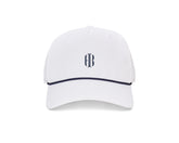 The Performance Rope Hat: White with HB Icon features a six-panel design, navy rope accent, embroidered monogram, UPF 50+ protection, and adjustable snap-back closure.