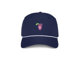 The Performance Rope Hat: Navy with Transfusion Icon features a pink slushy graphic, white rope trim, moisture-wicking fabric, UPF 50+ protection, and adjustable snap-back.