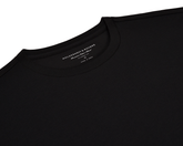 The Mason T-Shirt: Black, features a plain crew-neck design with a visible Holderness & Bourne label, highlighting its tailored fit and premium cotton blend.