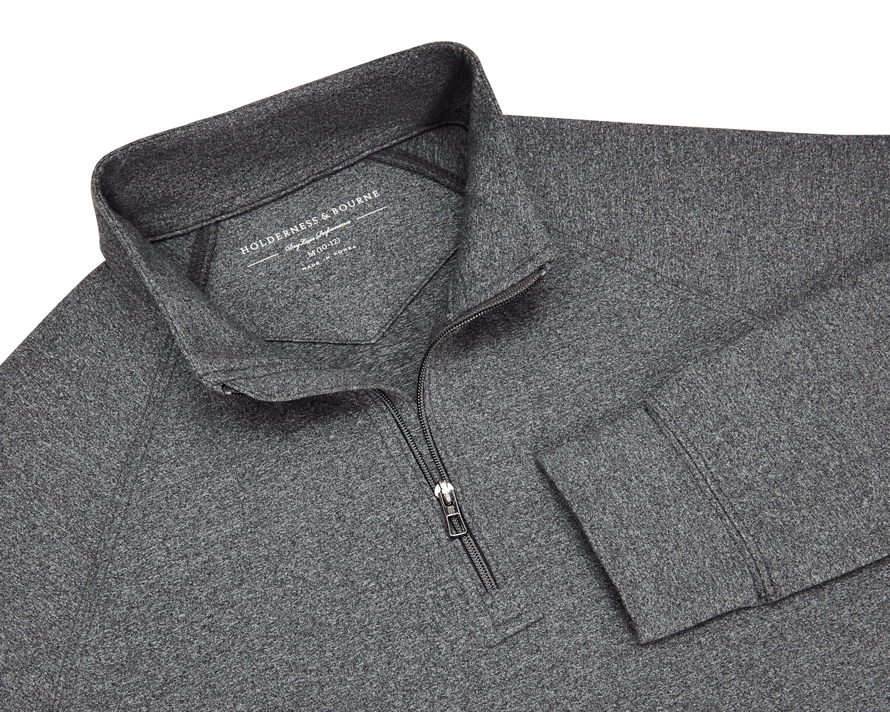 The Westland Boys Quarter-Zip: Charcoal, featuring a heathered design, stand-up collar, and quarter-length zipper, offering UPF 50+ protection and 4-way stretch for comfort.