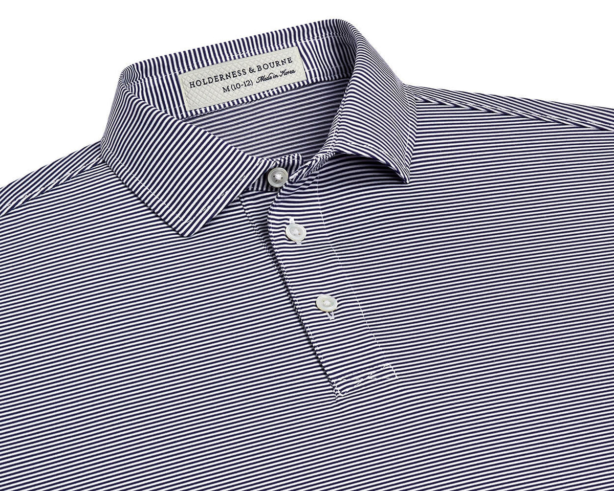 The Perkins Boys Shirt: Navy & White, features a micro-striped design, classic collar, and three-button placket, crafted from breathable DryLuxe fabric with UPF 50+ protection.