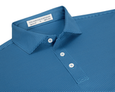The Perkins Shirt: Maidstone Blue & Harbor, featuring fine blue stripes, a classic collar, three-button placket, and H&B label, offers performance fabric with UPF 50+ protection.
