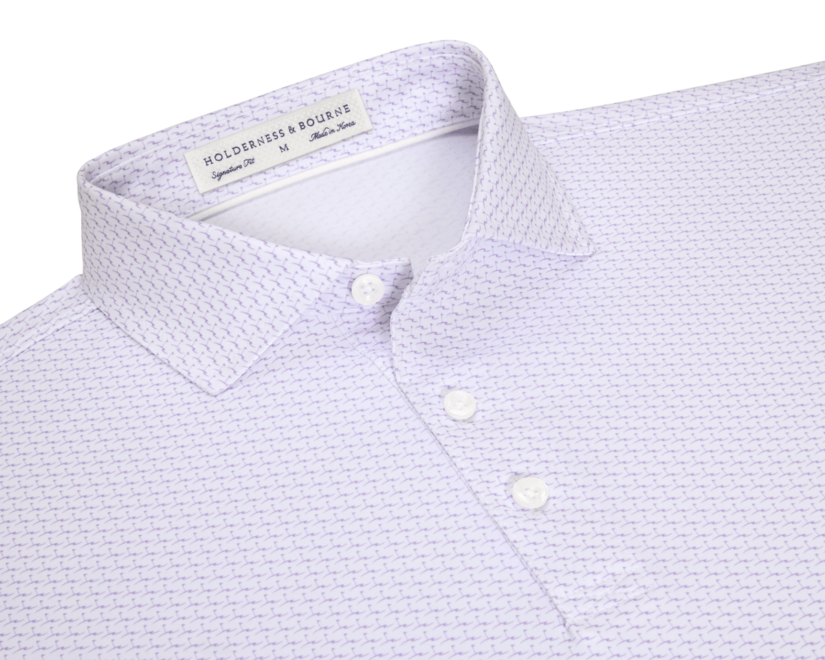 The Atwood Shirt: Tudor features a point collar, three-button placket, and herringbone print, offering comfort and performance with moisture wicking and sun protection.