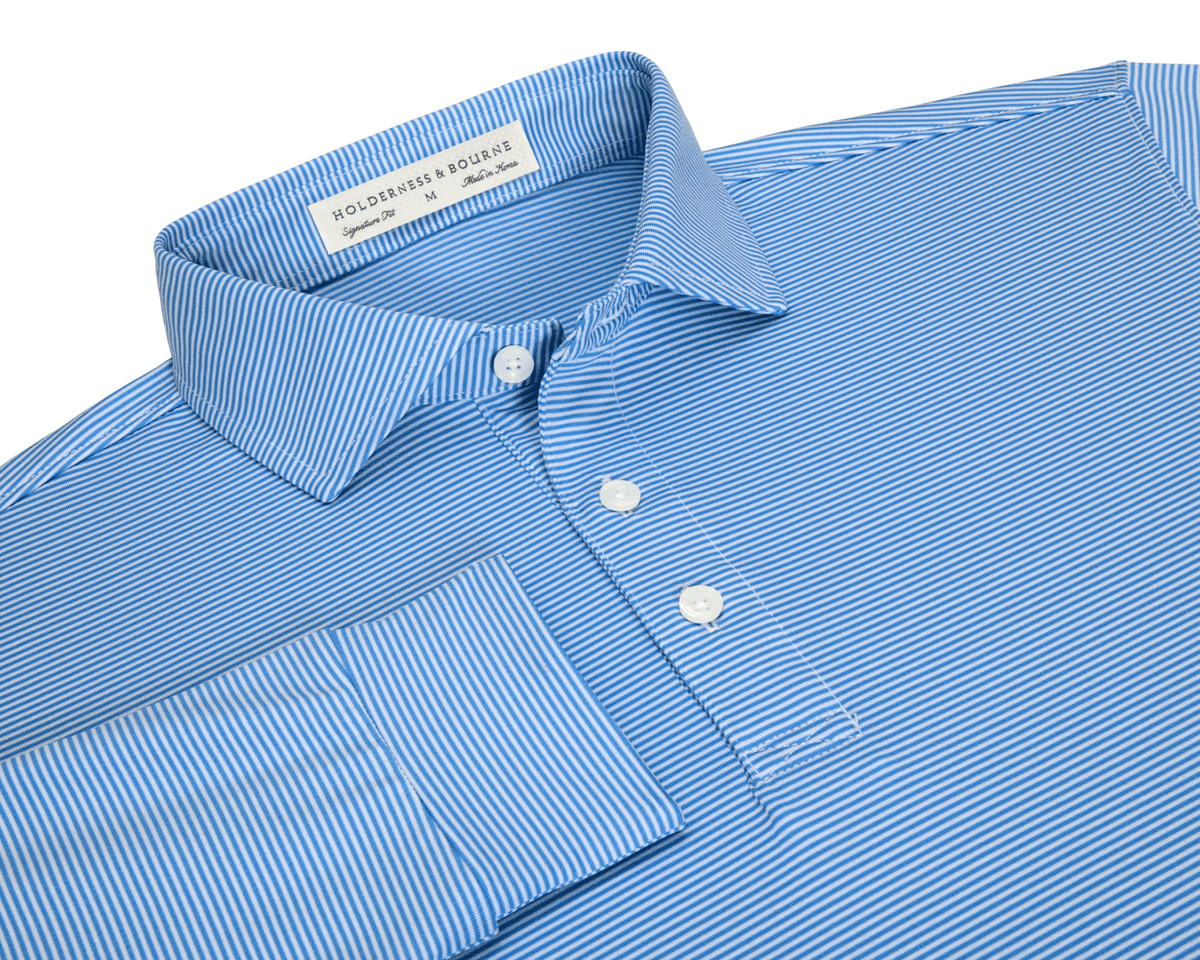 The Burke Shirt: Horizon Blue & White, featuring fine stripes, spread collar, button cuffs, and UPF 50+ protection for stylish, comfortable sun coverage.