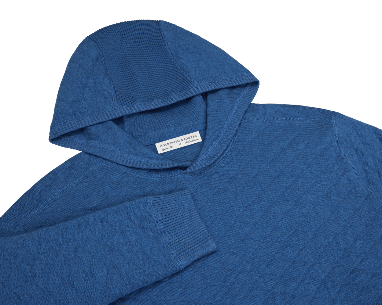 The Wallace Hoodie Sweater in heathered Maidstone blue, featuring ribbed hood lining, cuffs, and side panels, made from 100% Egyptian cotton.