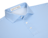 The Norman Shirt: Vista Blue & Horizon Blue, featuring a micro-textured dash pattern, spread collar, and white buttons, with performance jersey for comfort and UV protection.