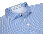 The Hanover Shirt: Maidstone Blue, a slim-fit men's button-down with spread collar, features a blue geometric pattern on white, offering comfort and sun protection.