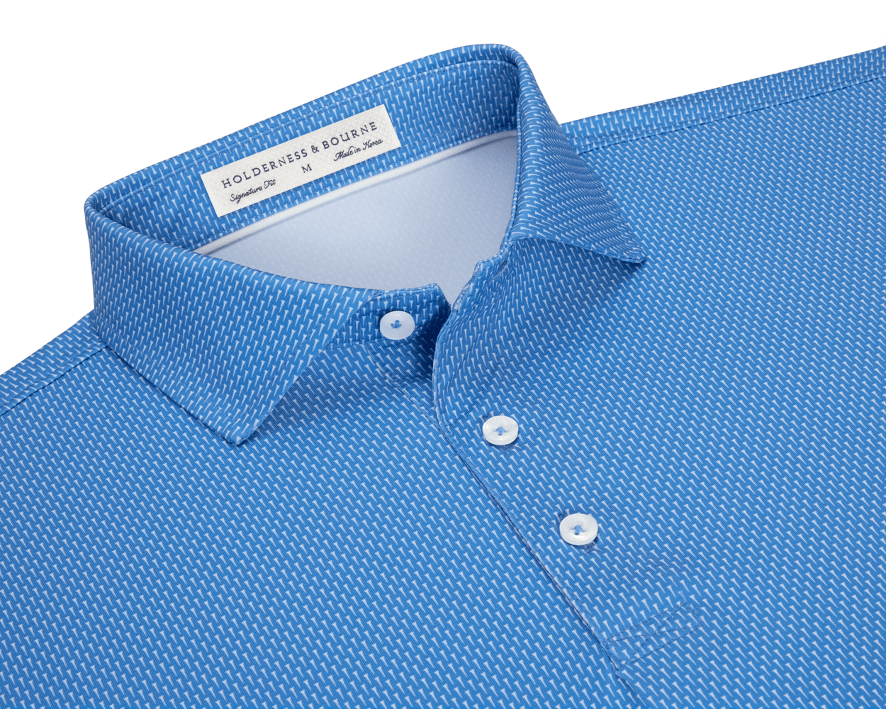 The Hicks Shirt: Horizon Blue, featuring a geometric white dash pattern, three-button placket, and structured collar. Offers moisture wicking, breathability, and UPF 50+ protection.