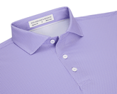 The Hicks Shirt: Tudor features a folded polo with a dash pattern, classic collar, three-button placket, and is crafted from breathable, moisture-wicking performance jersey.