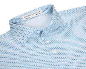 The Fulton Shirt: Harbor & Maidstone Blue, a light blue button-up with dark blue motifs, white buttons, and a classic point collar, by HOLDRENESS & BOURNE.
