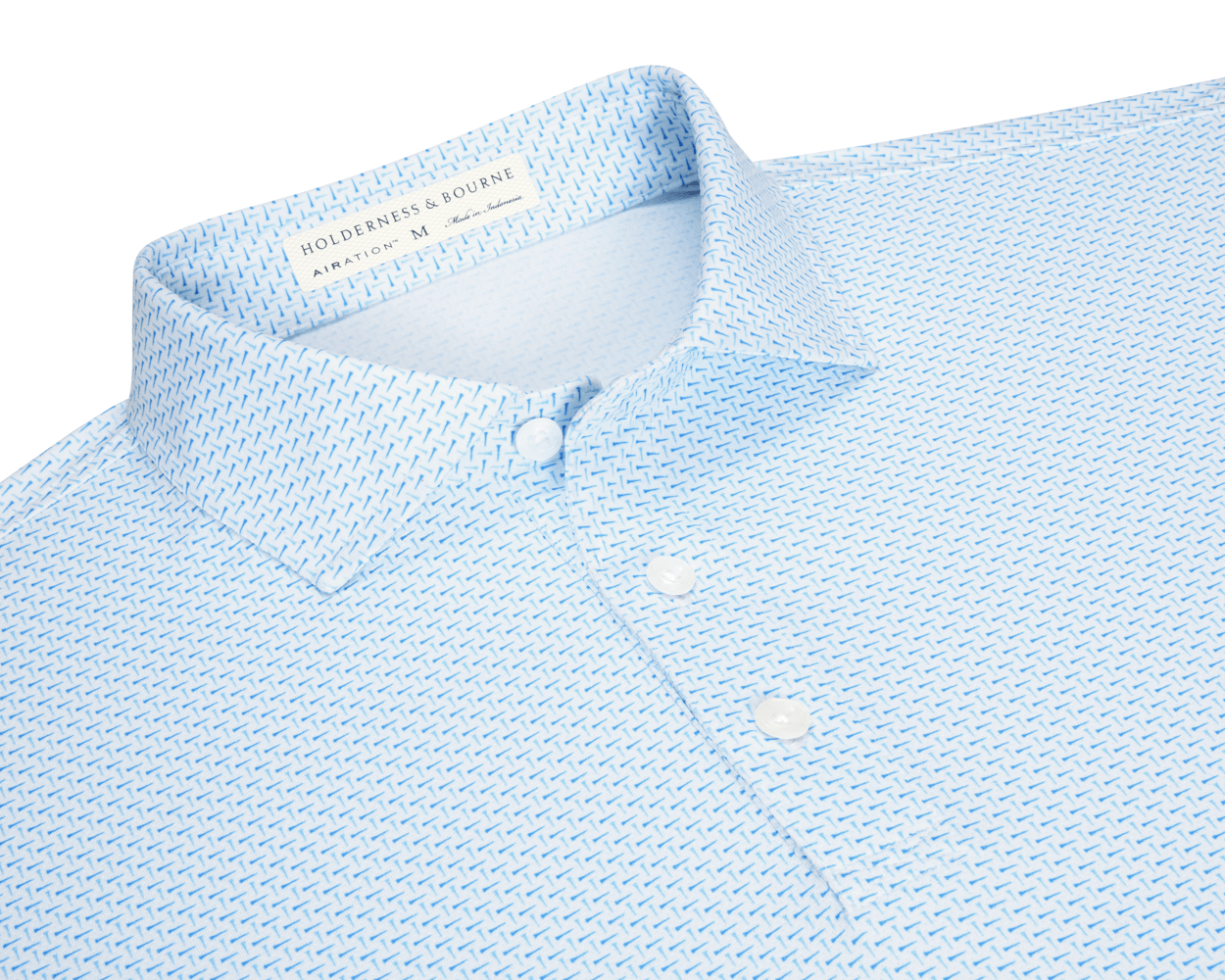 The Cromwell Shirt: Vista Blue & Horizon Blue, features a geometric print, white buttons, and a structured collar, made from AIRATION® fabric for breathability and comfort.