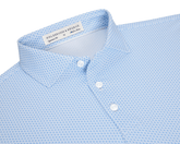The Lennox Shirt: Vista Blue & Horizon Blue, featuring a geometric pattern, spread collar, and three-button placket, offers breathable comfort and UPF 30+ protection.